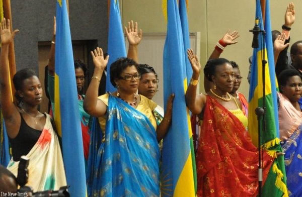Women parliamentarians swearing. Women make up 64% of parliament in Rwanda.