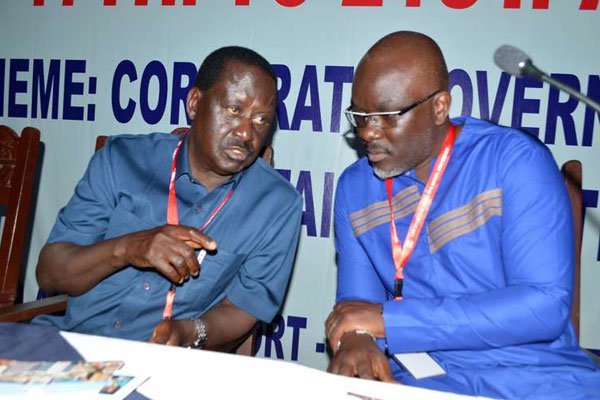 Cord co-principal Raila Odinga (left) with Law Society of Kenya president Isaac Okero at the body's annual conference at Leisure Lodge Beach and Golf Resort in Diani Beach, Kwale August 19, 2016.