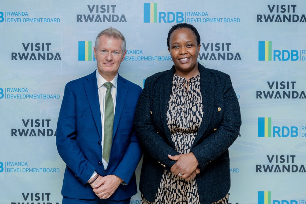 RDB CEO, Clare Akamanzi (right) posing for a photo with Bloomberg's Chief Commercial Officer, Stephen Colvin (left). 
