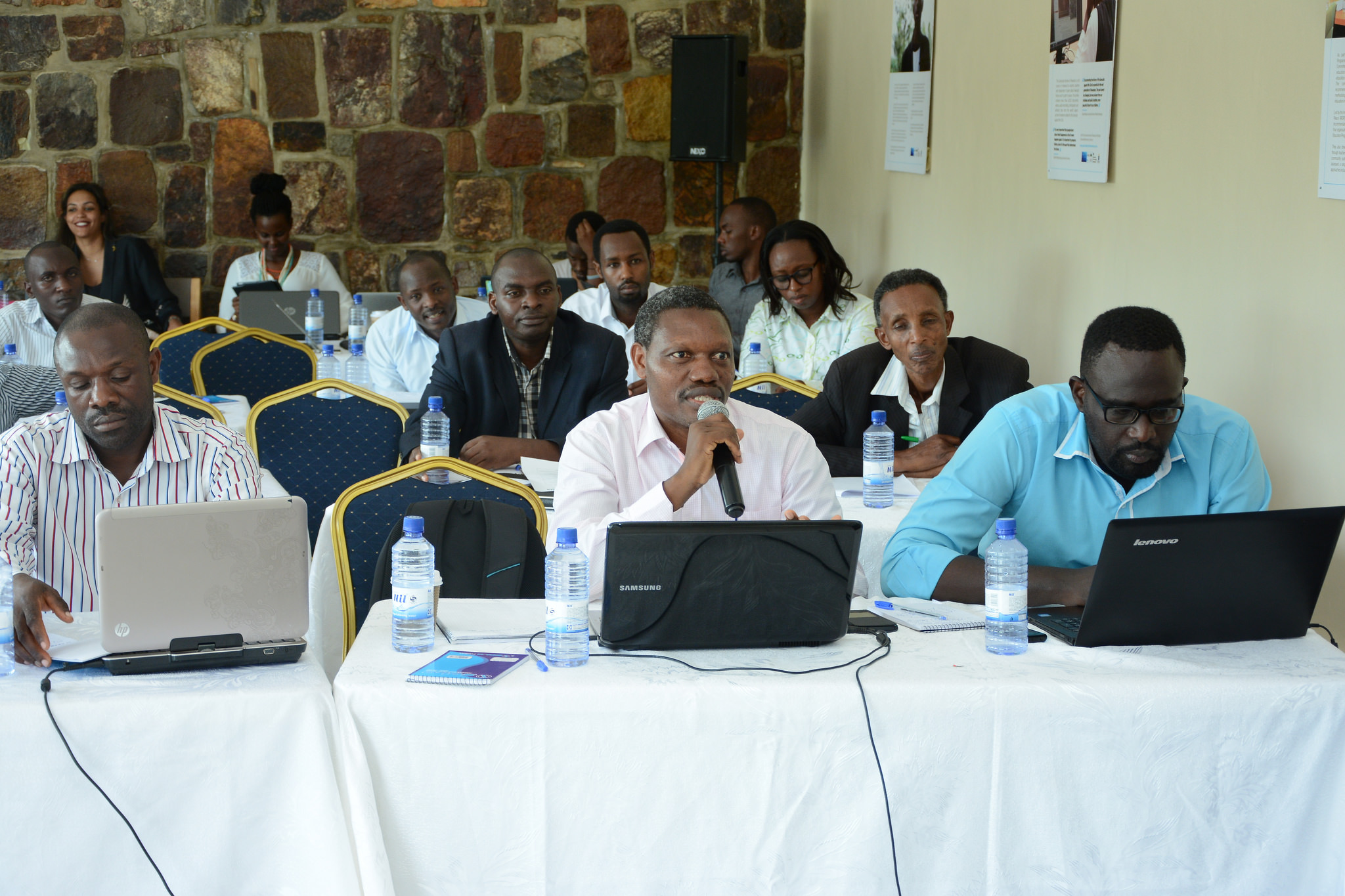 Researchers discussing methodologies and theories at the AEGIS Trust workshop.