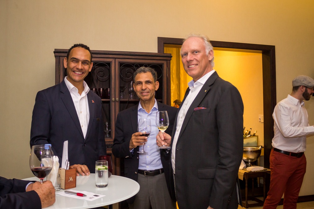 Rex A.G. Nijhof, Kigali Marriott’s General Manager (R), a guest (C) and Kigali Marriott's F & B Director Simon Hodson