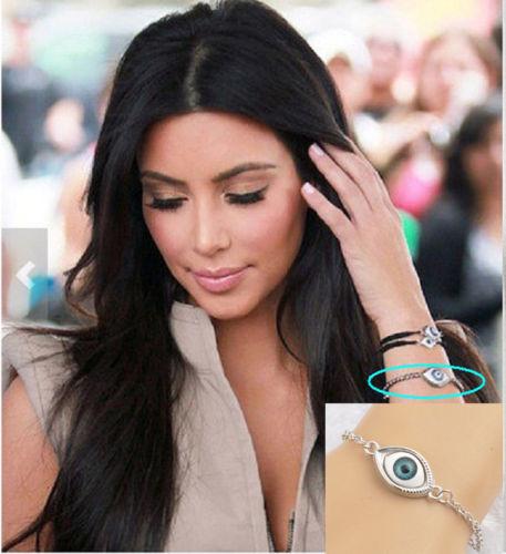 Famous Kim Kardashian, wearing the power balance bracelet