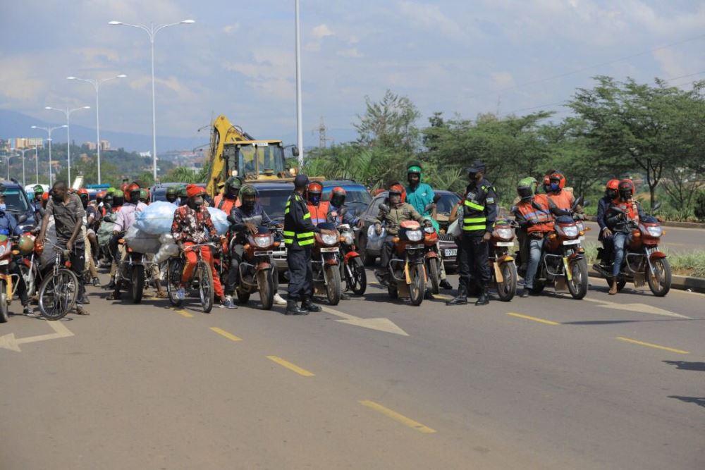 Police officers extending awareness to road users. 