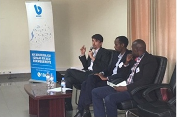 From the left: Simon Rolland (EnDev), Justus Mucyo (BBOXX) and Morris Kayitare (EDCL), answering questions from the audience.