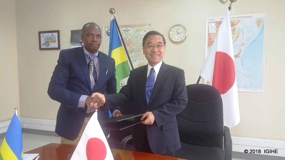 Amb. Miyashita and Munyurangabo after the signing of the grant