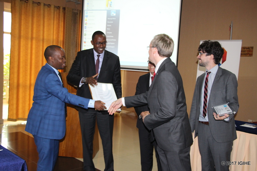 RSB Director General, Raymond Murenzi receives the certificate