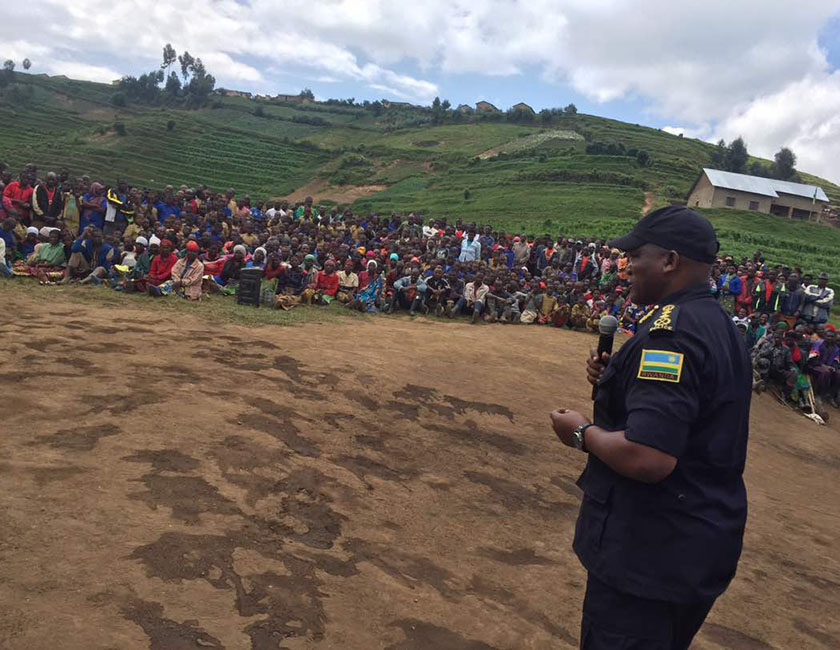 Deputy Inspector General of Police (DIGP), in charge of Administration and Personnel Juvenal Marizamunda addresses the residents during the event.