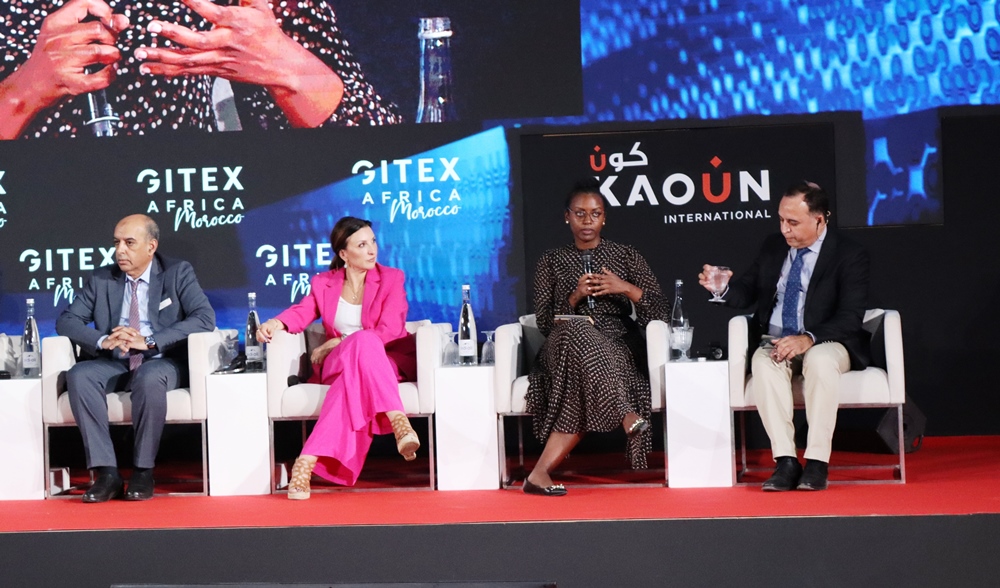 Tessy Rusagara (second from right) taking GITEX Africa participants through Rwanda's ambitious Kigali Innovation City project. 
