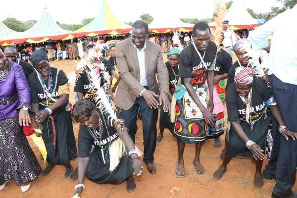Deputy President William Ruto joins traditional dancers at Mutomo KMTC in Kitui County on April 23, 2016.