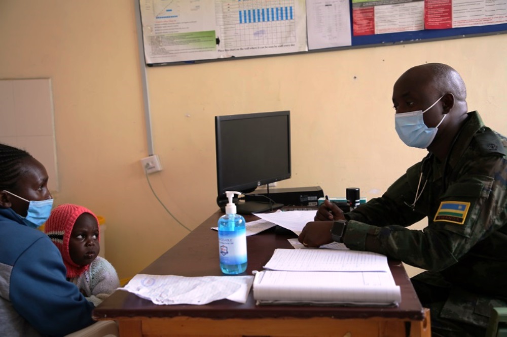 RDF officer attending to one of patients in Kenya.  