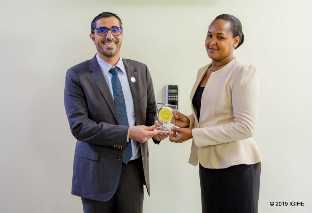 UAE Minister of Human Resource, Juma offered a token to the Minister of Youth, Rosemary Mbabazi