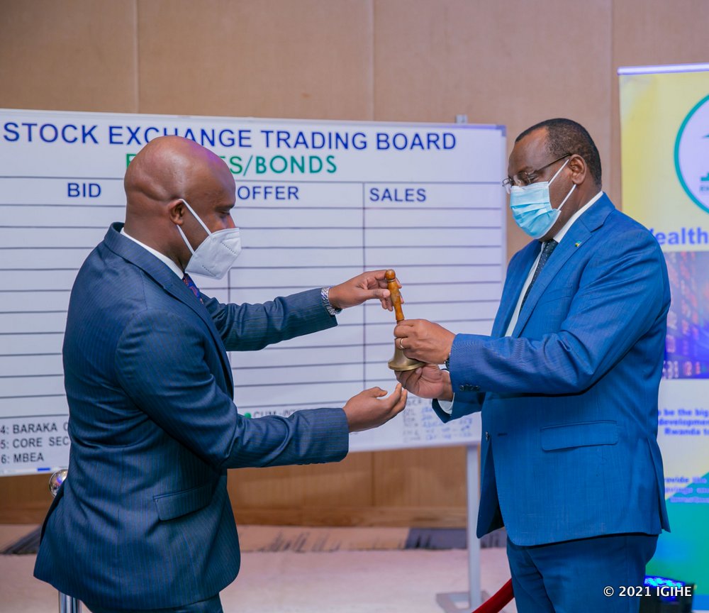 The CEO of Rwanda Stock Exchange, Pierre Celestin Rwabukumba and Minister of Infrastructure, Amb. Claver Gatete at the bell ringing event. 