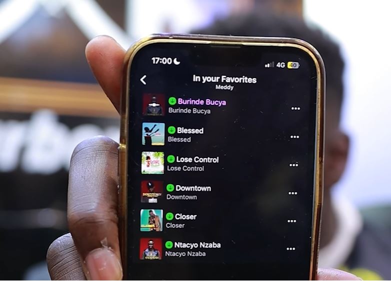 Sagna also showed IGIHE a selection of Meddy songs he frequently listens to on his phone, including Lose Control, Closer, and Ntacyo Nzaba.