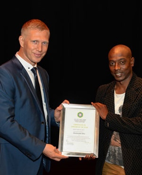 Cape Town mayoral committee member for safety and security JP Smith with Officer Masibulele Diko.