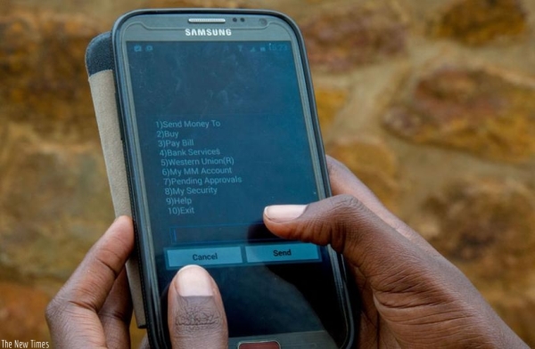 A phone user using the mobile money service.