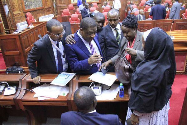 Members of the Senate Legal Affairs and Human Rights Committee during a hearing on the disputed electoral laws at County Hall in December.