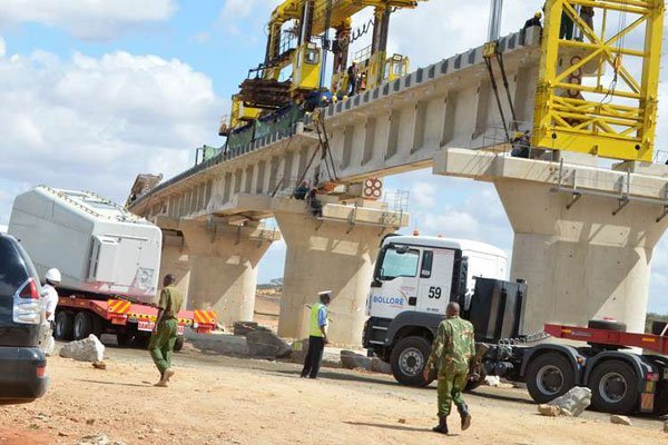 Workers constructing a section of the standard gauge railway (SGR). Transport PS Irungu Nyakera has said that the government is determined to ensure that Kenyans get the requisite skills and training to run the SGR line upon its completion.