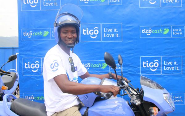 Shabani Nkomejekuyisenga on his new motorcycle