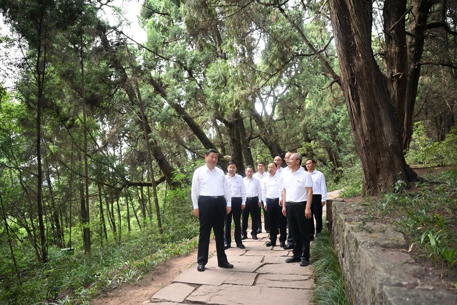 General Secretary of the Communist Party of China Central Committee Xi Jinping, also Chinese president and chairman of the Central Military Commission, visits the site of a section of an ancient road system known as "Shudao" in Guangyuan City, southwest China's Sichuan Province, July 25, 2023.  (Xinhua/Xie Huanchi)