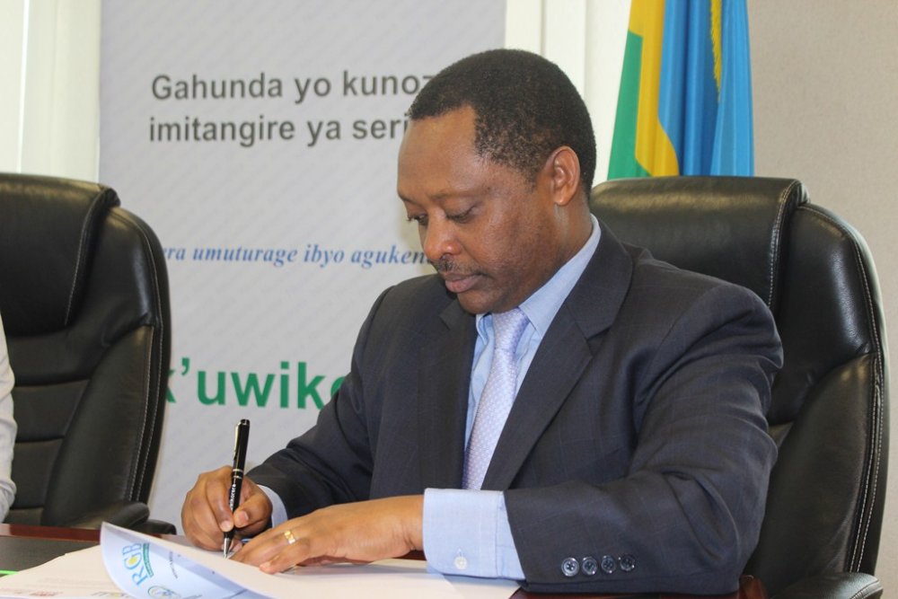 RGB Chief Executive Officer, Prof. Anastase Shyaka signing the agreement that will spur good services delivery through Joint Action Development Forum (JADF)