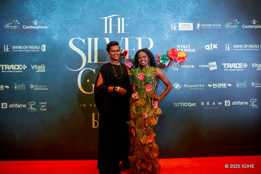 Minister of State for Youth and Arts Development, Umutoni Sandrine, is welcomed by Sherrie Silver on the red carpet.