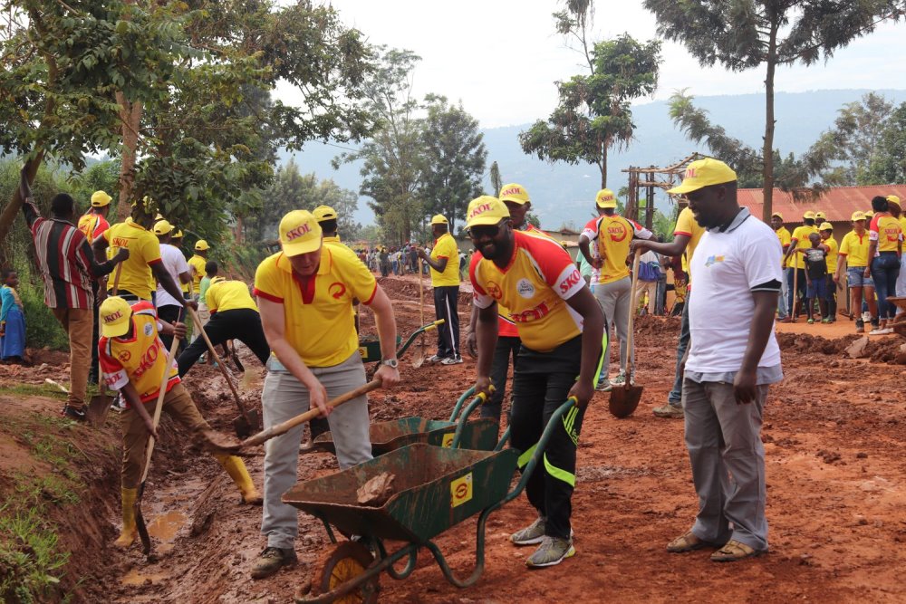 SKOL employees participating in a community work.