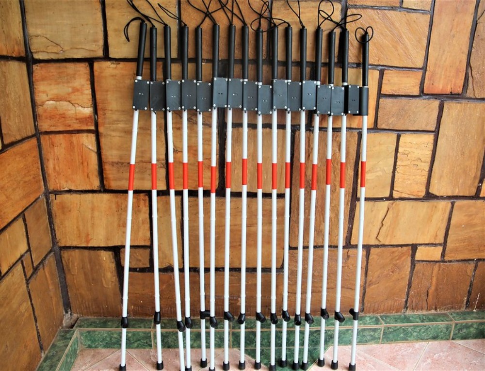 The high-tech white canes have sensors, which can help the user to differentiate day and night. Photo New Times 