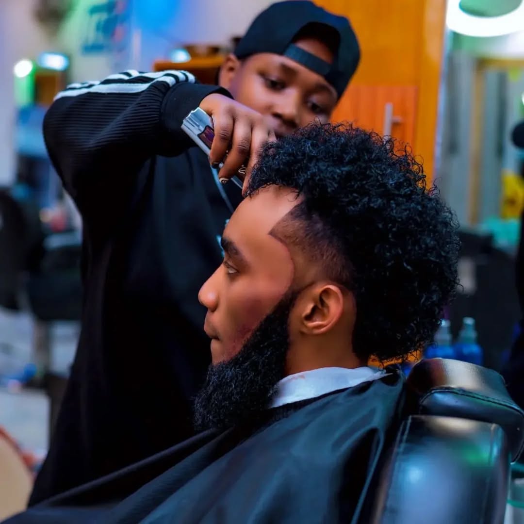 The Kigali barbershop scene offers fancy hairstyles like the undercut, pompadour, buzz cut, and quiff, among others.