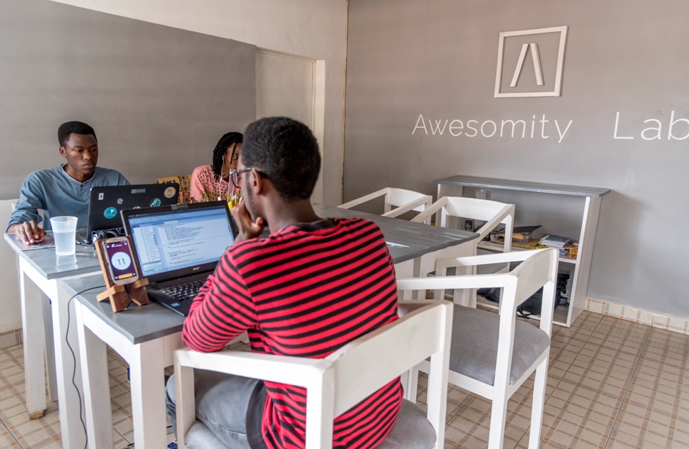 Some of the founders of Awesomity Lab at work
