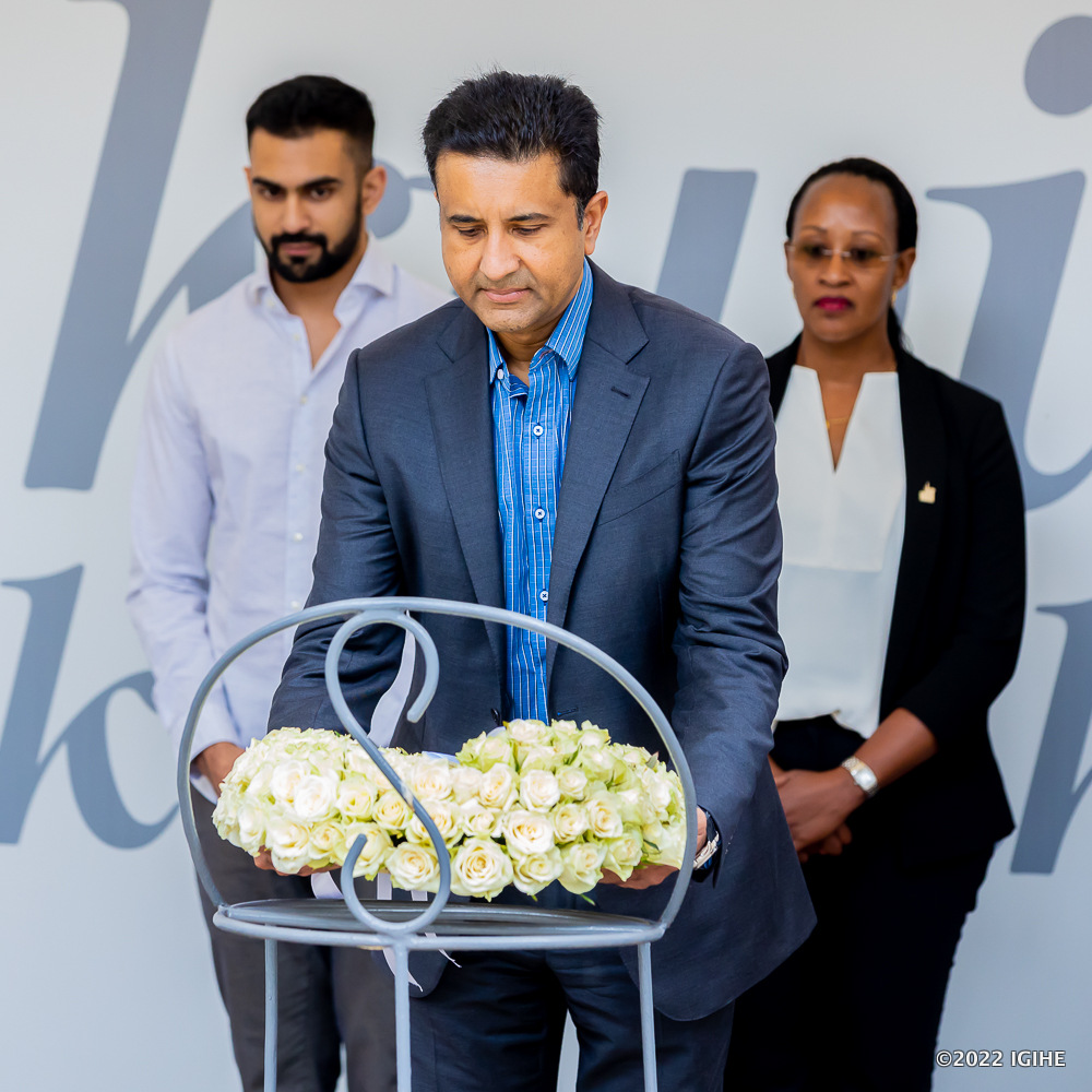 Sarit Raja-Shah laying a wreath at the mass grave at Kigali Genocide Memorial. 
