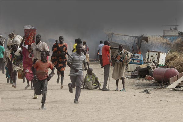 Mayhem. People in South Sudan running from clashes between government troops loyal to Salva Kiir and fighters backing his rival, former deputy Riek Machar.