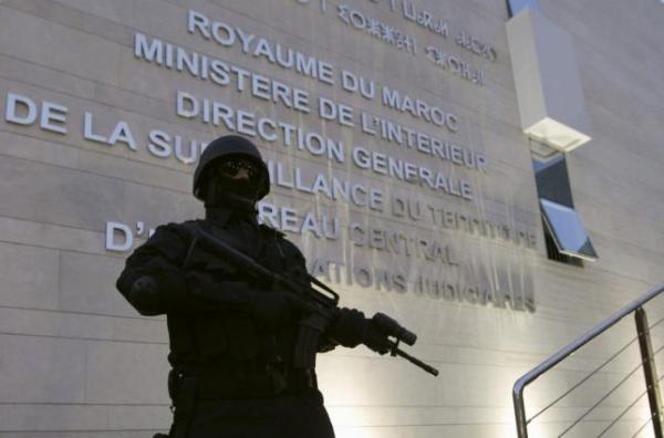 A Moroccan policeman stands guard at the Central Bureau of Judicial Investigation office in Sale, March 23, 2015.  REUTERS/Stringer A Moroccan policeman stands guard at the Central Bureau of Judicial Investigation office in Sale, March 23, 2015.