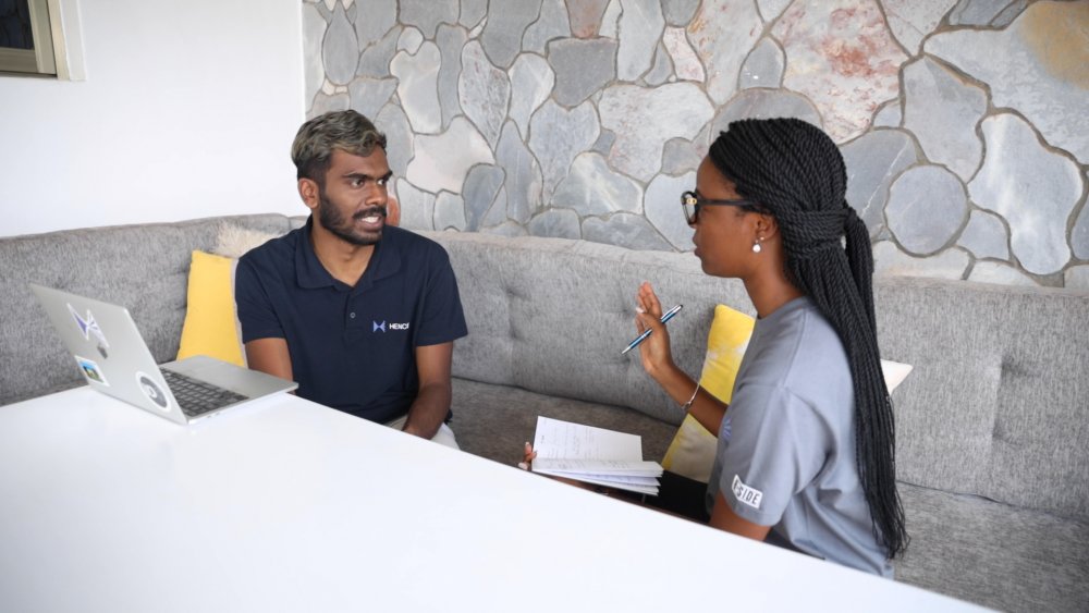 Arun Shanmuganathan, a co-founder at Hence Technologiestalking to the Business Development Manager, Nancy Ndekwe.