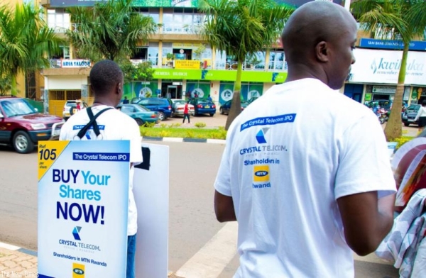 Crystal Telecom workers sell shares in Remera, Kigali, earlier this year.
