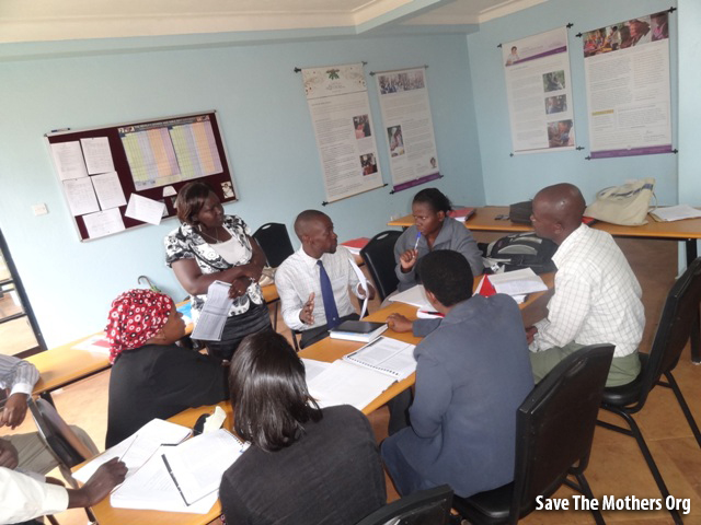 Save the Mothers students discussing in class.