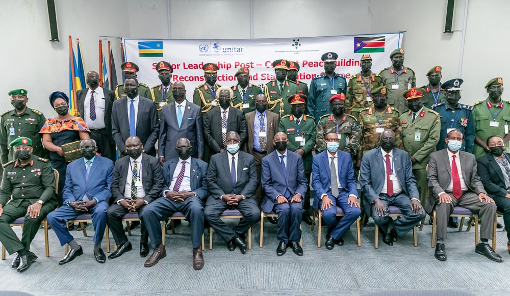 South Sudan officials with Rwandan counterparts in a group photo after completing the training. 