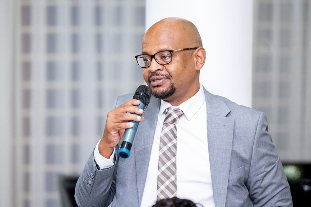 Sudanese business community representative Mohamed Ali Abuelgasim makes his remarks during the meeting on Saturday.