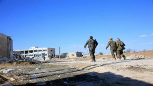Syrian state media says dozens of ISIL fighters were killed in the attack which led to the recapture of Kweires airbase