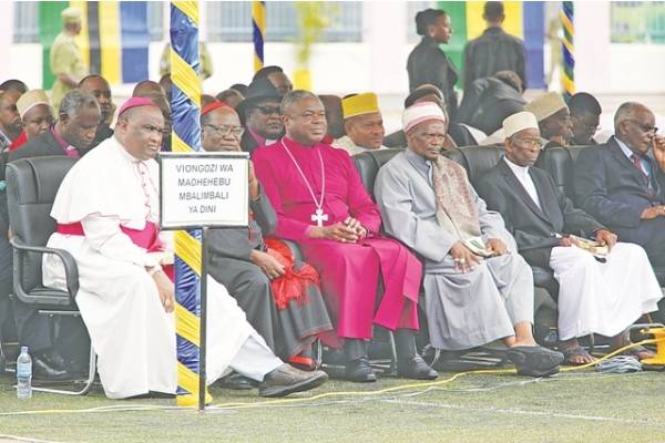 RELIGIOUS leaders follow the activities of the day.