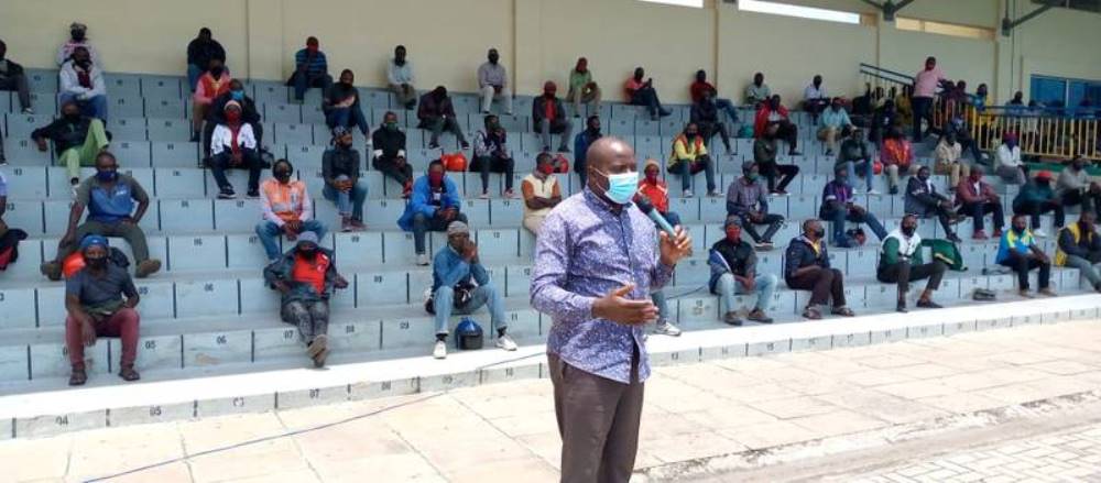 The Mayor of Rubavu, Gilbert Habyarimana speaking to motorcyclists.