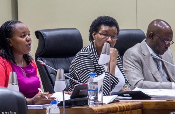 Deputy Speaker of Parliament in charge of Legislation Jeanne d'Arc Uwimanimpaye (L) explains the changes of different articles in the Constitution draft as Donatille Mukabalisa, the Speaker of Parliament, and Abbas Mukama, the Deputy Speaker in charge of finance and administration listen. (Doreen Umutesi)