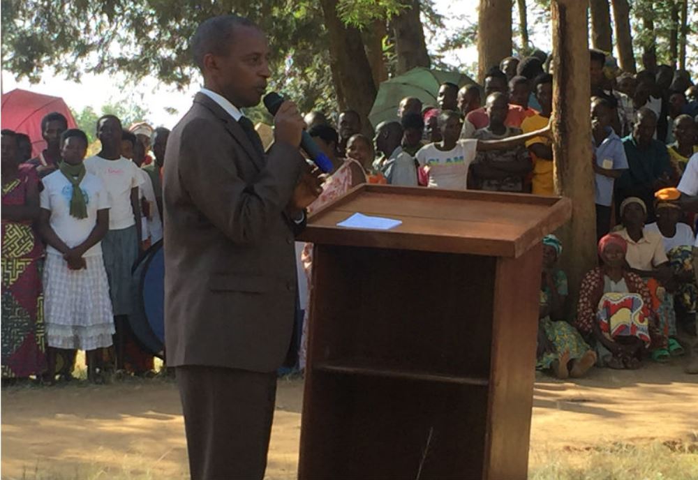 Bugesera Mayor welcoming residents and Tigo to the event