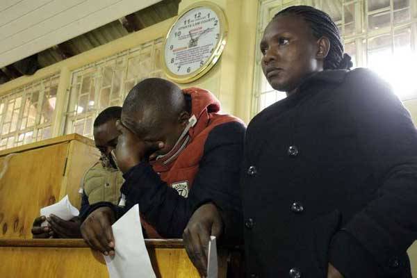 From left: Martin Mwangi Githinji, Kelvin Kamiri and Lucy Karambu appear in Othaya Law Courts on November 30, 2015 where they are facing charges of involvement in the October robbery of Sh30 million at Othaya Equity Bank branch.