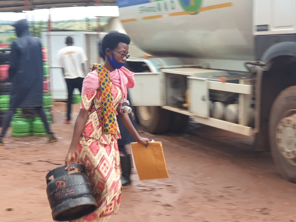 This lady from Mahama camp was carrying her gas cylinder after refilling. 