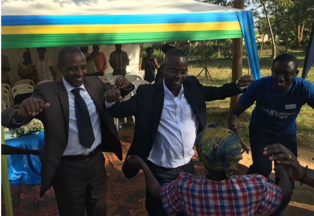 Tigo CEO Philip Amoateng joins the Mayor of Bugesera in a dance