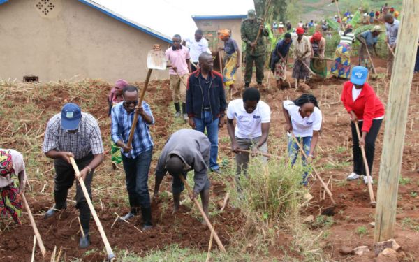 Tigo staff join Senate President and Southern Province Governor in Umuganda