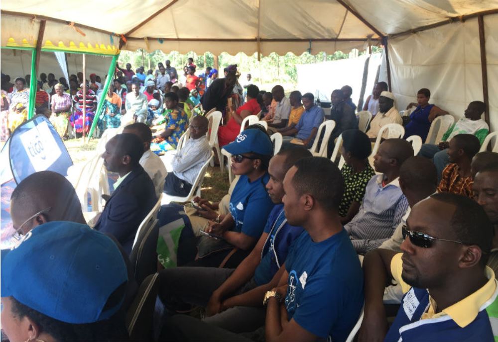 Tigo staff members traveled to Bugesera District to witness the handover of the Mutuelle de Sante cards