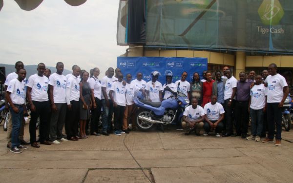 Tigo staff with the rewarded distribution team leaders