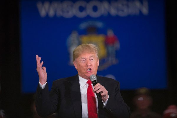 Republican presidential candidate Donald Trump speaks to guests during a campaign rally at the Radisson Paper Valley Hotel on March 30, 2016 in Appleton, Wisconsin.