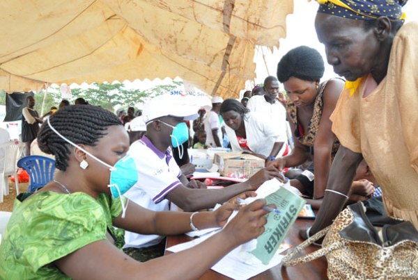 Medical workers register people during the World Tuberculosis Day in Gulu District recently.